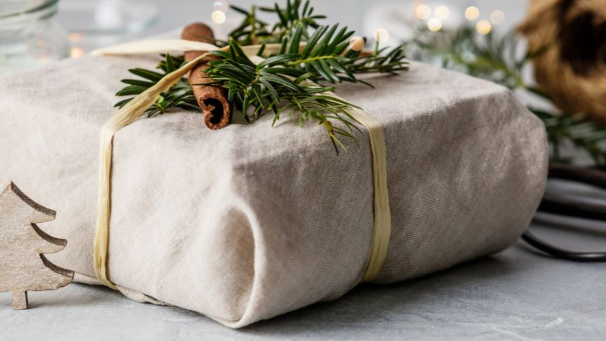 avoid using decorated gift wrap paper to reduce your environmental impact