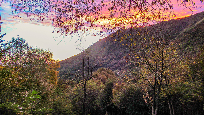 Landscape and sky with pink and yellow shades seen from Cargador agriturismo, Valdobbiadene